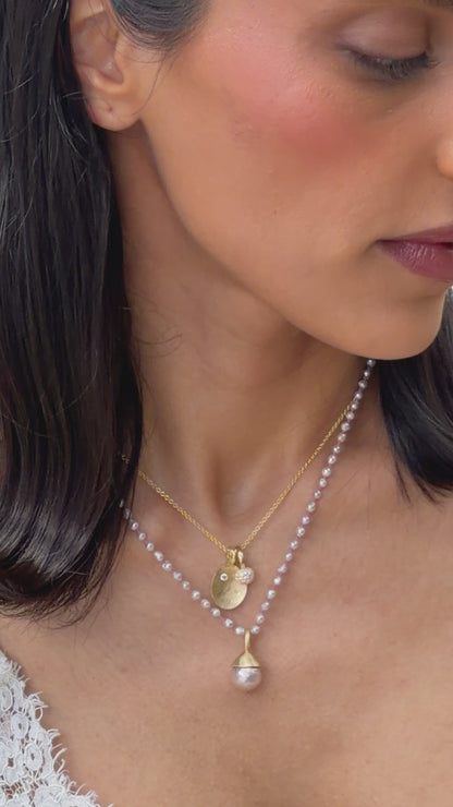 Baroque pearl charm with pearl bead necklace